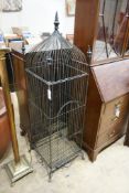 A painted wirework bird cage, height 150cm