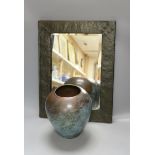 An Arts and Crafts planished copper mirror and a WMF Ikora vase