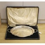 A cased George V silver two handled tea tray, with engraved inscription and crest, Synyer & Beddoes,