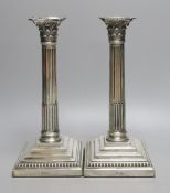 A pair of late Victorian silver Corinthian column candlesticks, maker's mark rubbed, London, 1890,