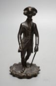 A Regency bronze tobacco box, surmounted by a figure of Dr. Syntax - 20cm tall
