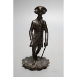 A Regency bronze tobacco box, surmounted by a figure of Dr. Syntax - 20cm tall