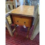 A 19th century Continental bird's eye maple drop flap work table, width 38cm, depth 53cm, height