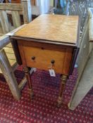 A 19th century Continental bird's eye maple drop flap work table, width 38cm, depth 53cm, height