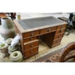 A mid 19th century oak kneehole desk, length 124cm, depth 63cm, height 78cm