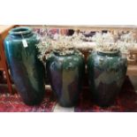 Three (two plus one) green glazed earthenware garden planters, tallest 87cm