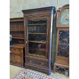 A 19th century French rosewood glazed armoire, width 108cm, depth 50cm, height 213cm