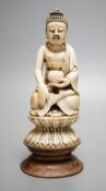 A 19th century Chinese ivory seated figure of Buddha Shakyamuni - 19cm tall