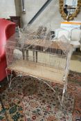 A painted wirework bird cage on stand, width 99cm, depth 36cm, height 117cm