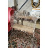 A painted wirework bird cage on stand, width 99cm, depth 36cm, height 117cm