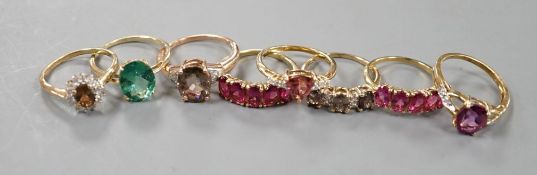 Seven assorted modern 9ct gold and gem set dress rings, including rubellite and a 14ct gold and