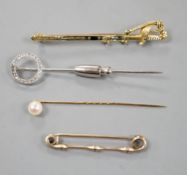 A French white metal (poincon mark for platinum) and diamond set tie pin, 64mm, gross 3.4 grams, a