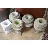 Five marble urns, largest height 31cm