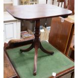 An early 19th century mahogany rectangular tilt top tripod table, width 64cm, depth 54cm, height