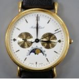 A modern 18k Mathey-Tissot calendar moonphase quartz wrist watch, on a black leather strap, no box