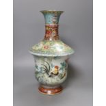 A Chinese famille rose vase, 20th century with drilled base mark - 33cm tall