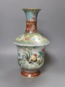 A Chinese famille rose vase, 20th century with drilled base mark - 33cm tall