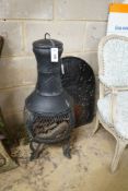 A cast metal chiminea, height 82cm