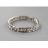 A white metal and diamond set full eternity ring, size Q, gross weight 2 grams.