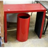 A contemporary red faux crocodile console table, width 80cm, depth 32cm, height 70cm and a stick