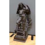 A cast spelter figure of a fireman performing rescue of a child,81 cms high.