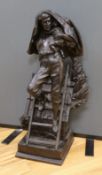 A cast spelter figure of a fireman performing rescue of a child,81 cms high.