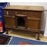 An Art Nouveau brass mounted oak buffet in the style of Voysey, length 124cm, depth 60cm, height