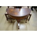 A Queen Anne revival walnut demi-lune folding card table, width 76cm, depth 38cm, height 76cm