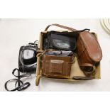 A pair of Taiga binoculars, various cameras etc.