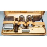 A leather cased gentleman's vanity set