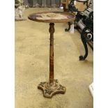 A Chinese lacquer circular wine table, diameter 36cm, height 67cm