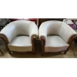A pair of leather upholstered continental tub chairs, width 88cm, depth 70cm, height 72cm