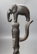 A late 19th/early 20th century Ceylonese carved ebony ‘elephant’ walking stick, 90cm