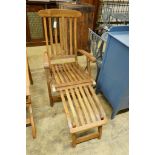 A teak brass mounted garden steamer chair, labelled Barlow Tyrie