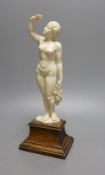 An early 20th century ivory figure of a nude maiden, possibly made in India or Burma for the