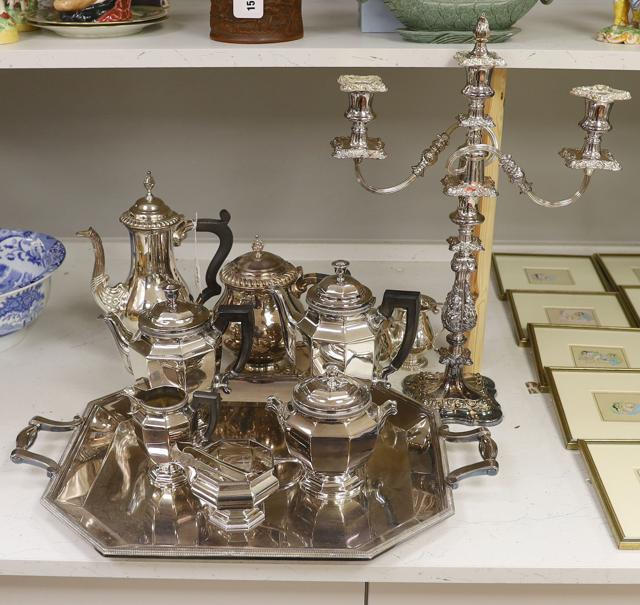 A French plated Cristofle tea set, together with other plated tea wares and a candelabrum