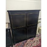 A 20th century black lacquer four door side cabinet, width 115cm, depth 45cm, height 135cm