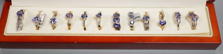 Nine assorted modern 9ct gold and tanzanite dress rings, one similar 14ct gold ring and two 925