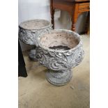 A pair of reconstituted stone circular garden planters, diameter 45cm, height 48cm