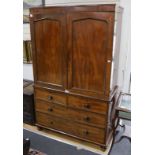 A Regency mahogany linen press, the top retaining sliding trays, length 124cm, depth 56cm, height