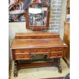 A Victorian mahogany kneehole dressing table, width 106cm, depth 55cm, height 144cm