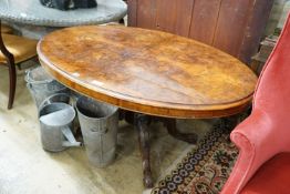 A Victorian oval burr walnut tilt top loo table, length 134cm, width 100cm, height 72cm