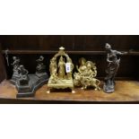 Three gilt metal deities, a faux bronze figure and one other, largest height 37cm