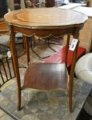 A Louis XVI style circular gilt metal mounted marquetry inlaid circular kingwood centre table,