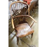 A mid 19th century ash and beech Windsor comb back armchair, width 56cm depth 43cm height 102cm