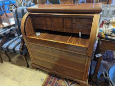 A reproduction cylinder bureau, width 110cm, depth 58cm, height 115cm