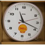 A Smith's 'Shell' advertising wall clock,32 cms diameter.