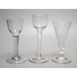 A George III opaque twist stem cordial glass, a George II cordial glass with folded foot and a