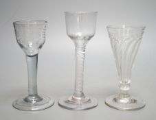 A George III opaque twist stem cordial glass, a George II cordial glass with folded foot and a