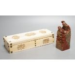 A decorative Chinese carved domino case and a soapstone figural seal (2)